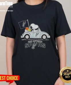 Alt Text: Snoopy driving a car in a San Antonio Spurs basketball themed ladies tee, perfect for sports fans.
