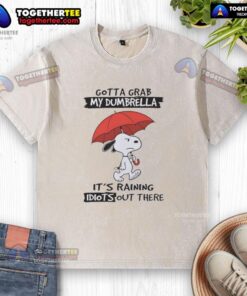 Good Snoopy t-shirt featuring 'Gotta Grab My Dumbrella, It's Raining Idiots Out There' design in vibrant colors.