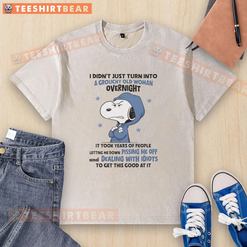 good-snoopy-grouchy-old-woman-letting-me-down-pissing-me-off-dealing-with-idiots-washed-t-shirt Alt Text: Good Snoopy t-shirt featuring a grouchy old woman, perfect for dealing with idiots and expressing frustration.