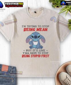 Alt Text: Worn t-shirt with text 'I'm Trying To Stop Being Mean' highlighting humor and frustration in playful design.