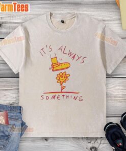 Good Sun Flower graphic on a washed T-shirt, perfect for casual wear and floral fashion lovers.