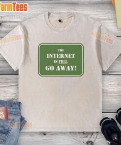 Alt Text: Good The Internet Is Full Go Away washed t-shirt displayed on a wooden background, showcasing a casual style.