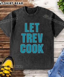 Alt Text: Good Trevor Lawrence Let Trev Cook Jacksonville Jaguars washed t-shirt featuring vibrant graphics and comfortable fit.