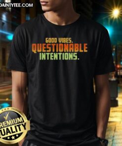 Good Vibes Questionable Intentions T-Shirt featuring a trendy design with bold text, perfect for casual wear.