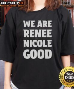 Renee Nicole Good wearing a 'Good We Are' ladies tee at a Minneapolis protest, showcasing solidarity and support.