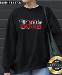 Good We Are The Swarm Sweatshirt featuring bold graphic design in vibrant colors, perfect for casual streetwear style.