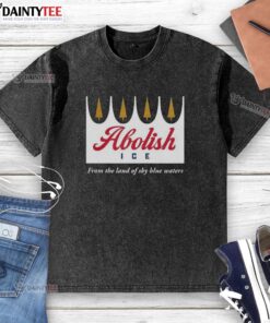 Happy Abolish ICE From The Land of Sky Blue Waters washed t-shirt featuring vibrant colors and a bold message.
