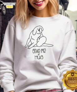 Cute happy dog wearing a 'Give Me A Hug' sweatshirt, perfect for pet lovers and cozy casual wear.