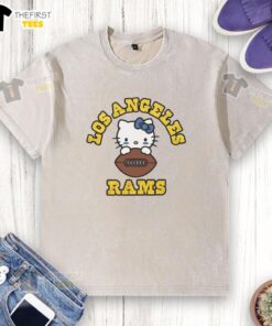 Happy Hello Kitty x Los Angeles Rams NFL logo washed t-shirt featuring a playful design perfect for fans and collectors.