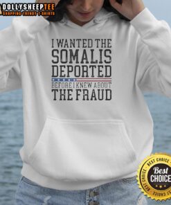 Happy person wearing 'I Wanted The Somalis Deported Before The Fraud' hoodie, showcasing bold political statement.
