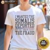 Happy person wearing 'I Wanted The Somalis Deported Before The Fraud' T-shirt, promoting a controversial political message.