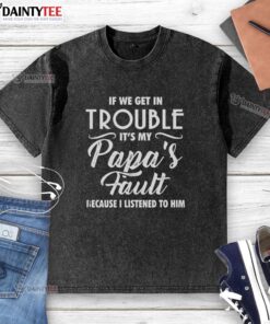 Happy child wearing a 'If We Get in Trouble It's My Papa's Fault' t-shirt, showcasing a playful family bond.