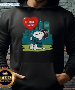 Alt Text: Happy Jacksonville Jaguars X Snoopy cartoon Valentine 2026 hoodie featuring vibrant graphics and team colors.