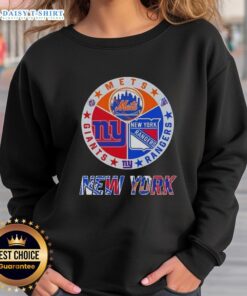 Alt Text: Happy New York City sports sweatshirt featuring Mets, Rangers, and Giants logos for fans of NYC teams.