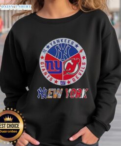 Happy New York City sports sweatshirt featuring Yankees, Devils, and Giants logos for passionate fans.