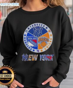 Alt Text: Happy New York City Sports Yankees Knicks Rangers logos combine sweatshirt showcasing iconic team designs.