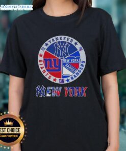 Alt Text: Happy New York City sports logos on ladies tee featuring Yankees, Rangers, and Giants for fans.
