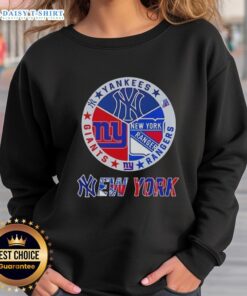 Alt Text: Happy New York City sports sweatshirt featuring Yankees, Rangers, and Giants logos in a stylish design.