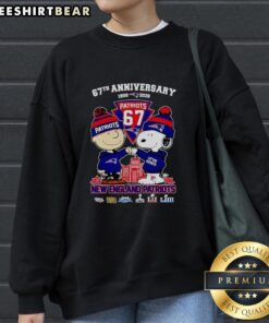 Alt Text: Snoopy and Charlie Brown celebrating 67 years of New England Patriots football on a cozy sweatshirt.