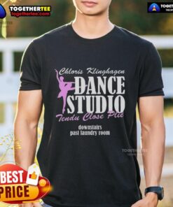 Alt Text: Hot Chloris Klinghagen in a dance studio performing a tendu close pli, wearing a stylish letter T-shirt.