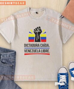 Protest against dictatorship in Venezuela featuring a 'Venezuela Libre' washed t-shirt, symbolizing freedom and resistance.