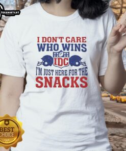 Hot I Don't Care Who Wins NFL ladies tee with two helmets and IDC logo, perfect for game day snacks and fun.