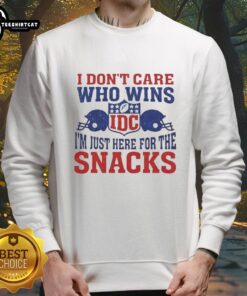 Hot I Dont Care Who Wins NFL sweatshirt with helmets and IDC logo, perfect for game day snacks and fan spirit.
