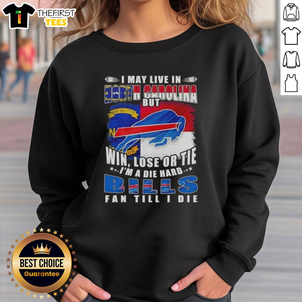 hot-i-may-live-in-north-carolina-but-win-lose-or-tie-im-a-die-hard-buffalo-bills-fan-till-i-die-sweatshirt Die-hard Buffalo Bills fan sweatshirt, proudly displaying North Carolina pride with a bold sports slogan.