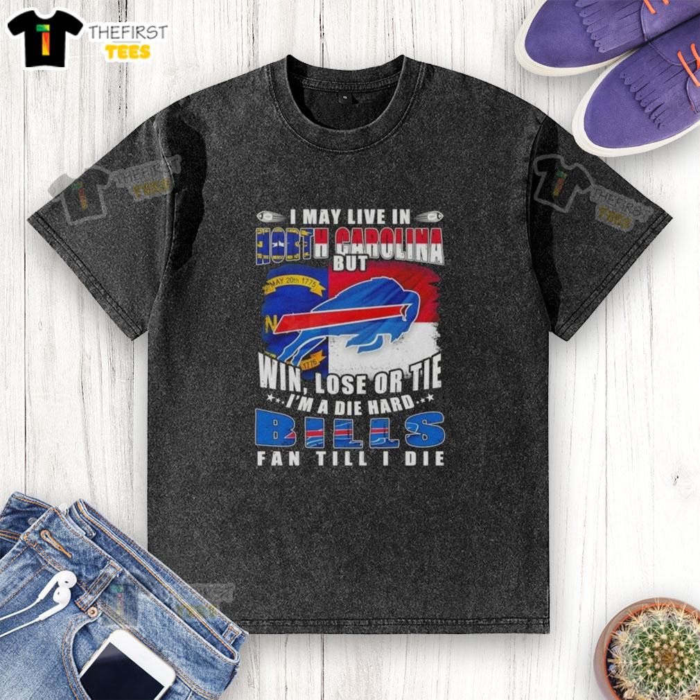 hot-i-may-live-in-north-carolina-but-win-lose-or-tie-im-a-die-hard-buffalo-bills-fan-till-i-die-washed-t-shirt Die-hard Buffalo Bills fan wearing a washed t-shirt that says 'I may live in North Carolina, but I'm a Bills fan.'