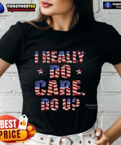 Hot I Really Do Care Do U USA Flag Ladies Tee - stylish women's shirt featuring a patriotic design and bold text.