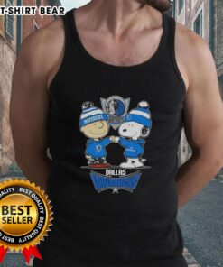 Snoopy giving a high five to Charlie Brown, both wearing Dallas Mavericks tank tops, celebrating their team spirit.