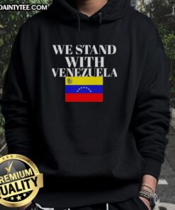 Person wearing a Hot We Stand With Venezuela Flag Hoodie, showcasing support for Venezuela with vibrant colors and bold design.