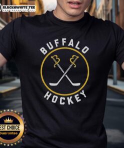 Alt Text: Buffalo Sabres hockey logo T-shirt featuring vibrant colors and team branding, perfect for fans and casual wear.