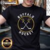 Alt Text: Buffalo Sabres hockey logo T-shirt featuring vibrant colors and team branding, perfect for fans and casual wear.