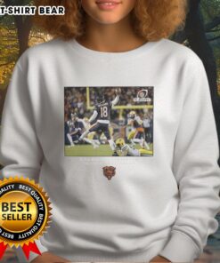 Caleb Williams wearing a Chicago Bears NFL Wild Card sweatshirt, showcasing team spirit and style.