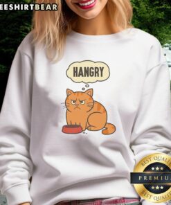 Cute cat looking hungry while wearing a cozy 'Nice Cat Feeling Hangry' sweatshirt, perfect for feline lovers.