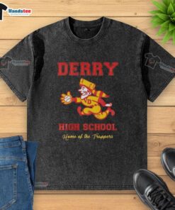 Nice Derry High School Home of the Trappers washed t-shirt displayed on a hanger, showcasing school spirit and style.