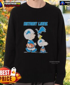 Detroit Lions sweatshirt featuring Snoopy and Charlie Brown, perfect for fans of the Nice Detroit Lions collection.