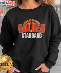 Nice Golden Standard Sweatshirt in a cozy setting, showcasing its stylish design and vibrant color.