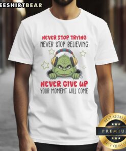 Nice Grinch Never Stop Trying Never Stop Believing T-Shirt featuring a festive design and motivational text.