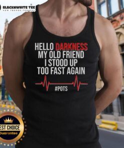 Person wearing 'Nice Hello Darkness My Old Friend' tank top, standing up quickly, showcasing stylish graphic tee.