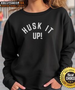 Nice Husk It Up Nebraska Cornhuskers Sweatshirt featuring bold team logo, perfect for fans and game day attire.