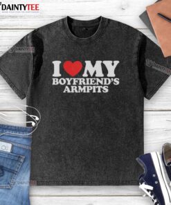 Person wearing a 'Nice I Love My Boyfriend's Armpits' red heart washed t-shirt, showcasing a fun and quirky fashion statement.