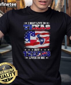 Man wearing 'Nice I May Live In Texas But Houston Texans Lives In Me' US flag T-shirt, showcasing team pride and Texas spirit.