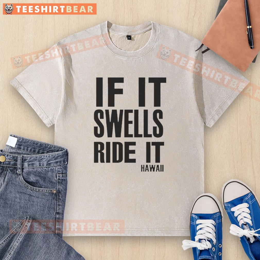 nice-if-it-swells-ride-it-hawaii-washed-t-shirt Alt Text: Nice If It Swells Ride It Hawaii washed t-shirt featuring a vibrant beach graphic and relaxed fit.