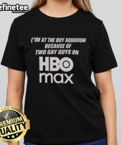 Two guys at an aquarium wearing HBO Max-themed ladies' tees, showcasing a fun day out.