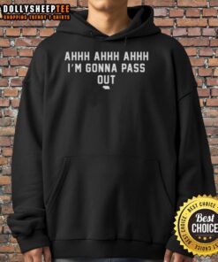 Alt Text: Person wearing a Nebraska Cornhuskers hoodie, looking tired and relaxed, showcasing team spirit and comfort.