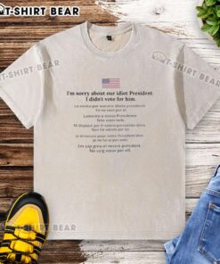 Washed t-shirt with 'Im Sorry About Our Idiot President' design, expressing a political stance against the current leader.