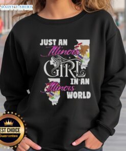 Illinois girl wearing a 'Just an Illinois Girl in an Illinois World' sweatshirt, showcasing local pride and style.