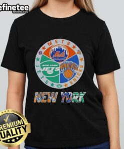 Nice New York City sports logos for Mets, Knicks, and Jets on a ladies tee showcasing team pride and style.